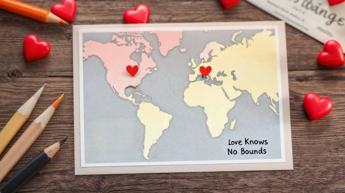 A hand-drawn or printed map with hearts marking your locations, symbolizing that love knows no distance.