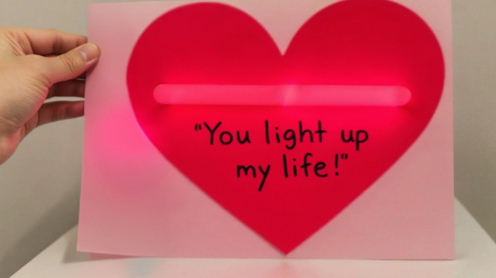 Glow sticks attached to the card with the sweet message, “You light up my life!” for a bright and cheerful surprise.
