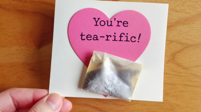 A cute pun-filled card with a teabag attached, reading “You’re tea-rific!” for a warm and cozy gesture.