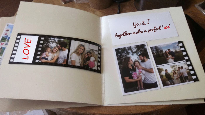 A roll of printed photos featuring the sweetest moments together, capturing the essence of love in a cinematic way.