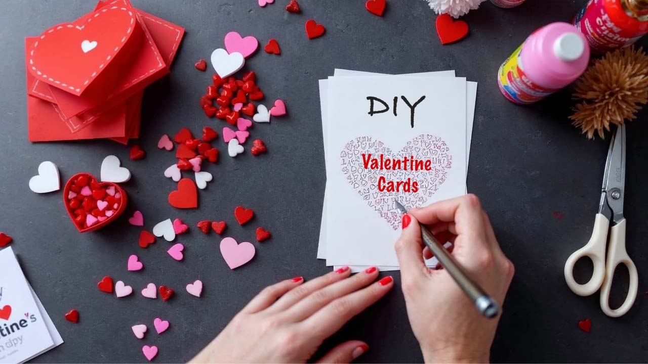 A person carefully crafting a heartfelt DIY Valentine's Day card, surrounded by colorful paper, glitter, and markers.
