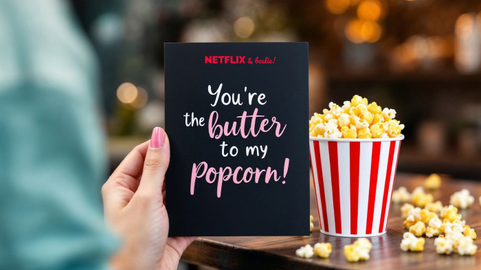 A cozy-themed card featuring popcorn illustrations and the phrase “You’re the butter to my popcorn!” celebrating movie nights and friendship.