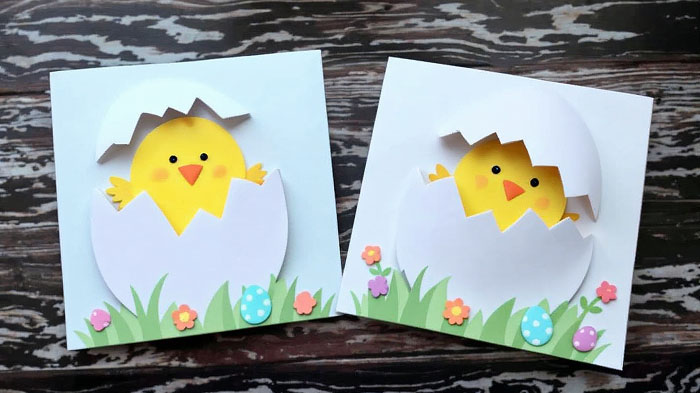 Chick hatching from a paper egg with a movable cracked top.