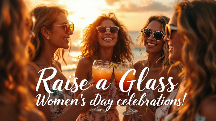 Group of women clinking glasses at brunch, celebrating Women’s Day together.
